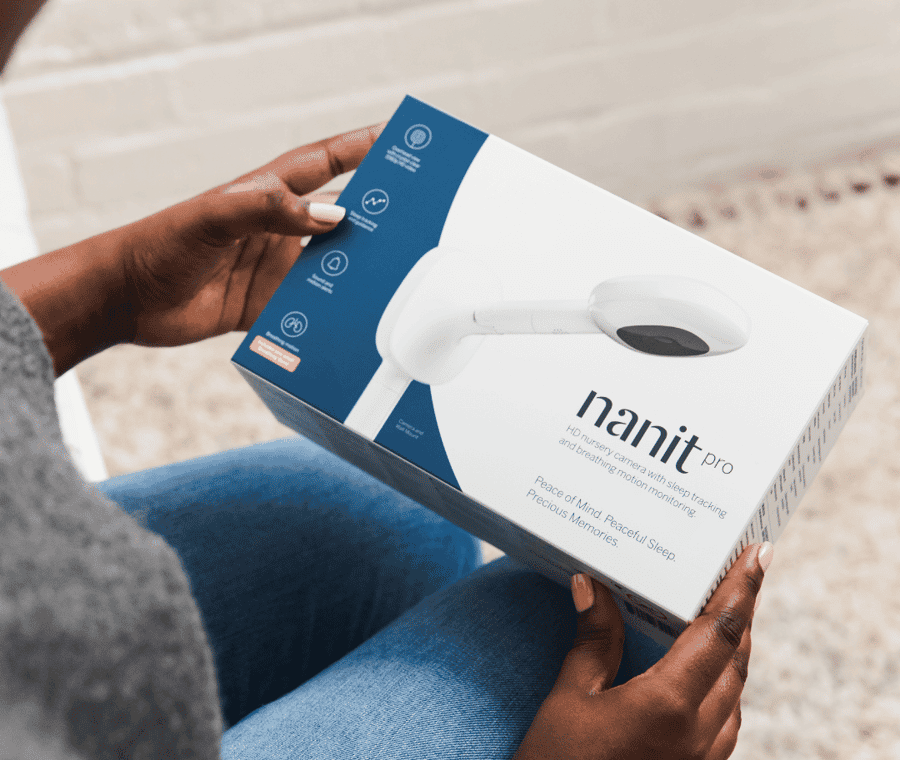 Women holding Nanit Pro Packaging